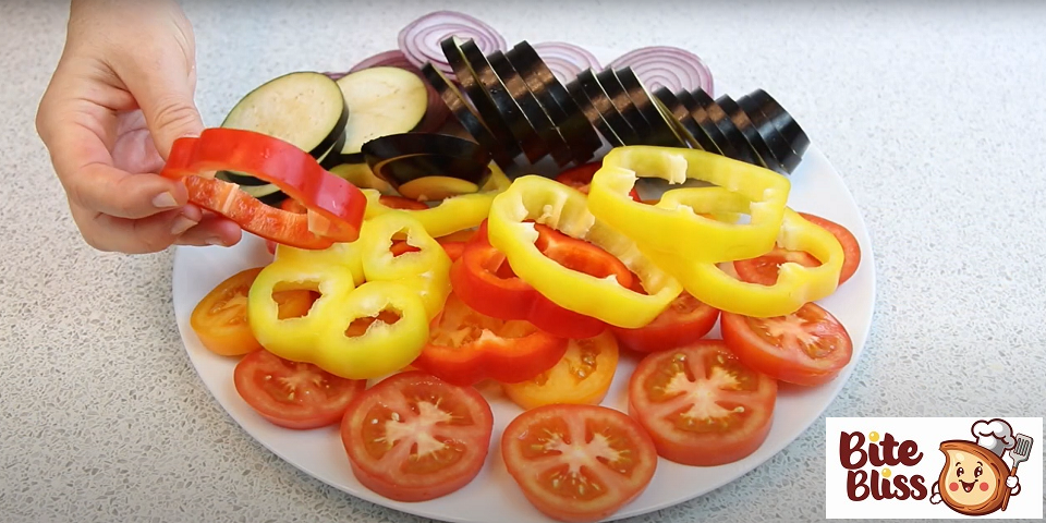 I cut pepper into thick circles, tomatoes and eggplants I prefer to cut a little thinner.