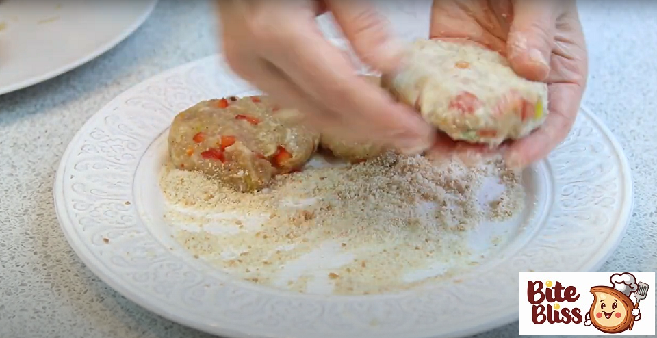 Stuffing is divided into cutlets for breading you will need a few tablespoons of grated breadcrumbs wet hands form cutlets and roll in breadcrumbs.